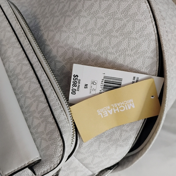 White Michael kors back bag/backpack with matching wallet